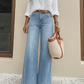 Beinverlängernde Wide-Leg Jeans