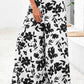 Weit geschnittene Hose mit Blumenmuster und hoher Taille