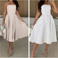 Elegantes, farbloses trägerloses Midi -Kleid