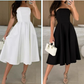 Elegantes, farbloses trägerloses Midi -Kleid