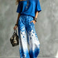 🏷️ Räumung -50%! Set aus einem Top mit U-Ausschnitt und schulterfreiem Schnitt sowie einer weiten Hose mit Leopardenmuster und Ombré-Effekt