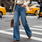 Beinverlängernde Wide-Leg Jeans