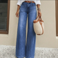 Beinverlängernde Wide-Leg Jeans