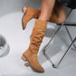 Modische und bequeme kniehohe Stiefel mit Blockabsatz