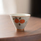Klassisch bemalte, glatte, glasierte Keramik-Teetasse