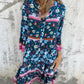 Lässiges Kleid mit Blumenmuster, V-Ausschnitt und Knopfleiste