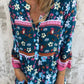 Lässiges Kleid mit Blumenmuster, V-Ausschnitt und Knopfleiste