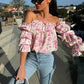 Geblümtes, gesmoktes Off-Shoulder-Top