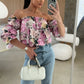 Geblümtes, gesmoktes Off-Shoulder-Top