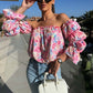 Geblümtes, gesmoktes Off-Shoulder-Top