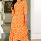 Trendiges orangefarbenes bedrucktes Damenkleid mit 3/4-Ärmeln