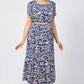 Trendy Damenkleid mit blauem Aufdruck, kurzärmlig, fließend und mit Gürtel