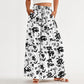 Weit geschnittene Hose mit Blumenmuster und hoher Taille