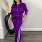Schicker sportlicher Trainingsanzug – Outfit aus langärmliger Jacke und Hose