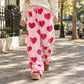 💥Nur wenig übrig!💥 Damen-Plüschhose mit Herzprint und weitem Bein